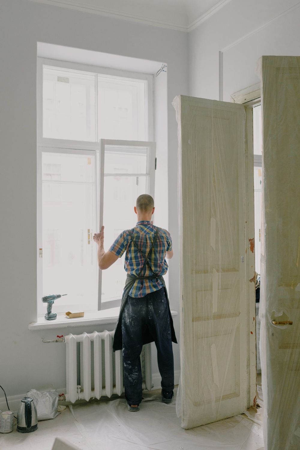 A worker carrying out a residential window repair